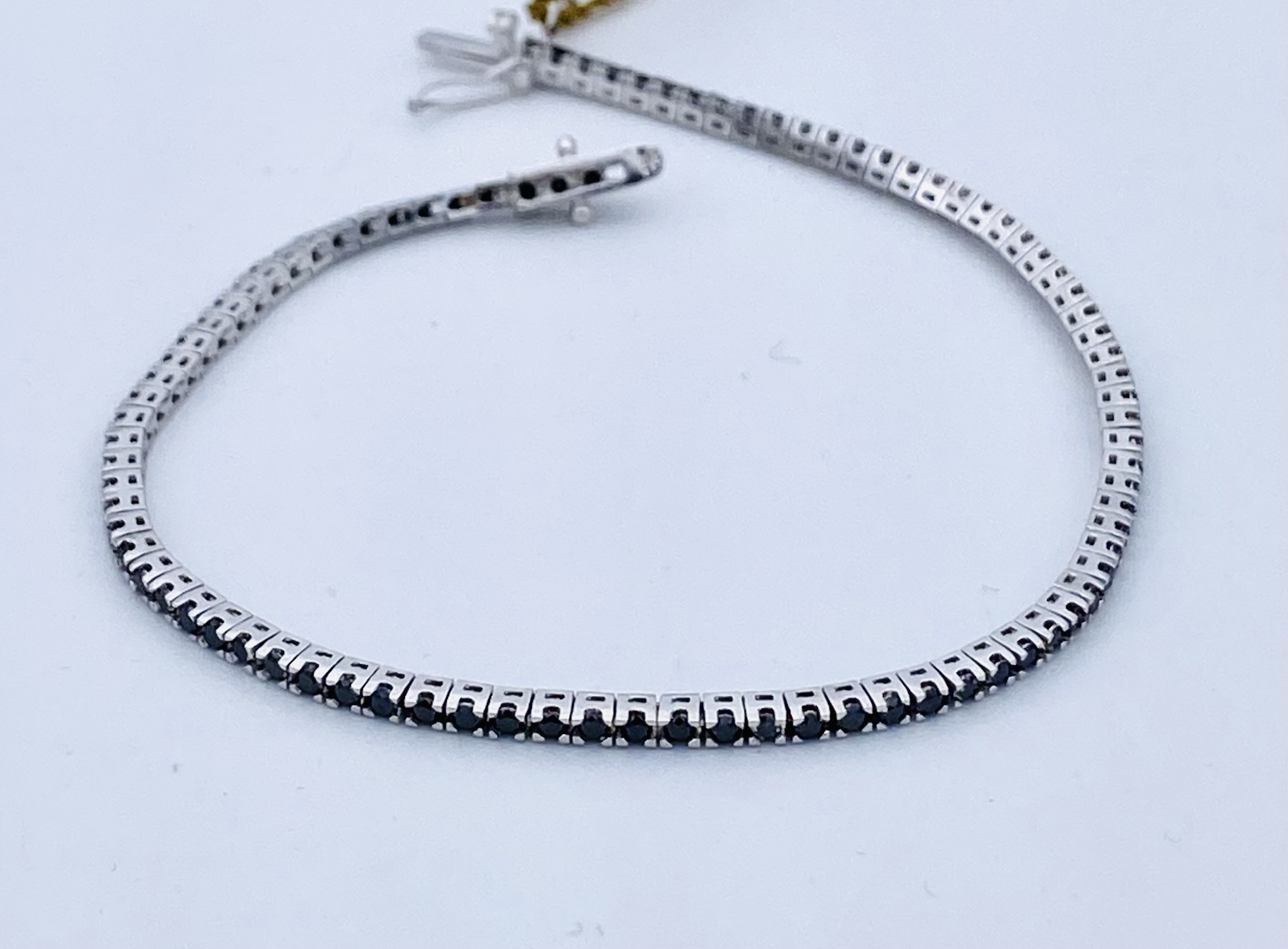 Bracciale tennis diamanti neri oro bianco 750% art.BR256