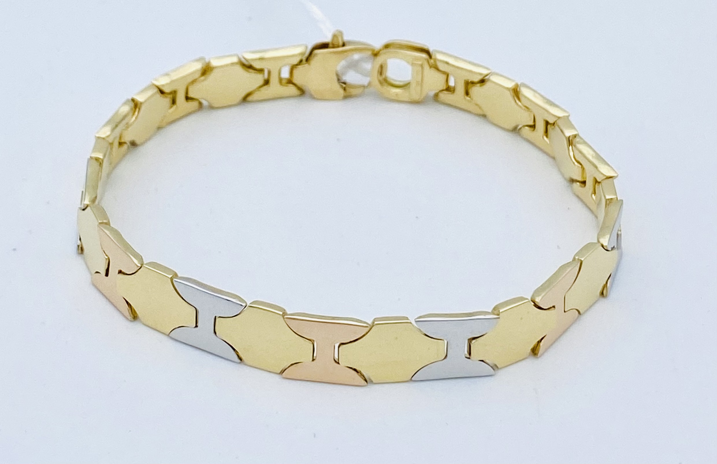 Bracciale uomo oro giallo,bianco,rosa 750% GR. 18,50 ART. BRUC01